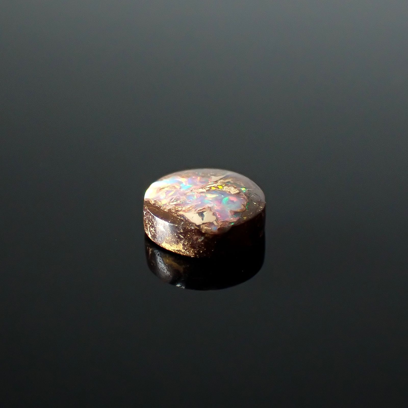 ウッドオパール オーストラリア産 0.52ct / 5.7x5.6mm前後 [251031195]
