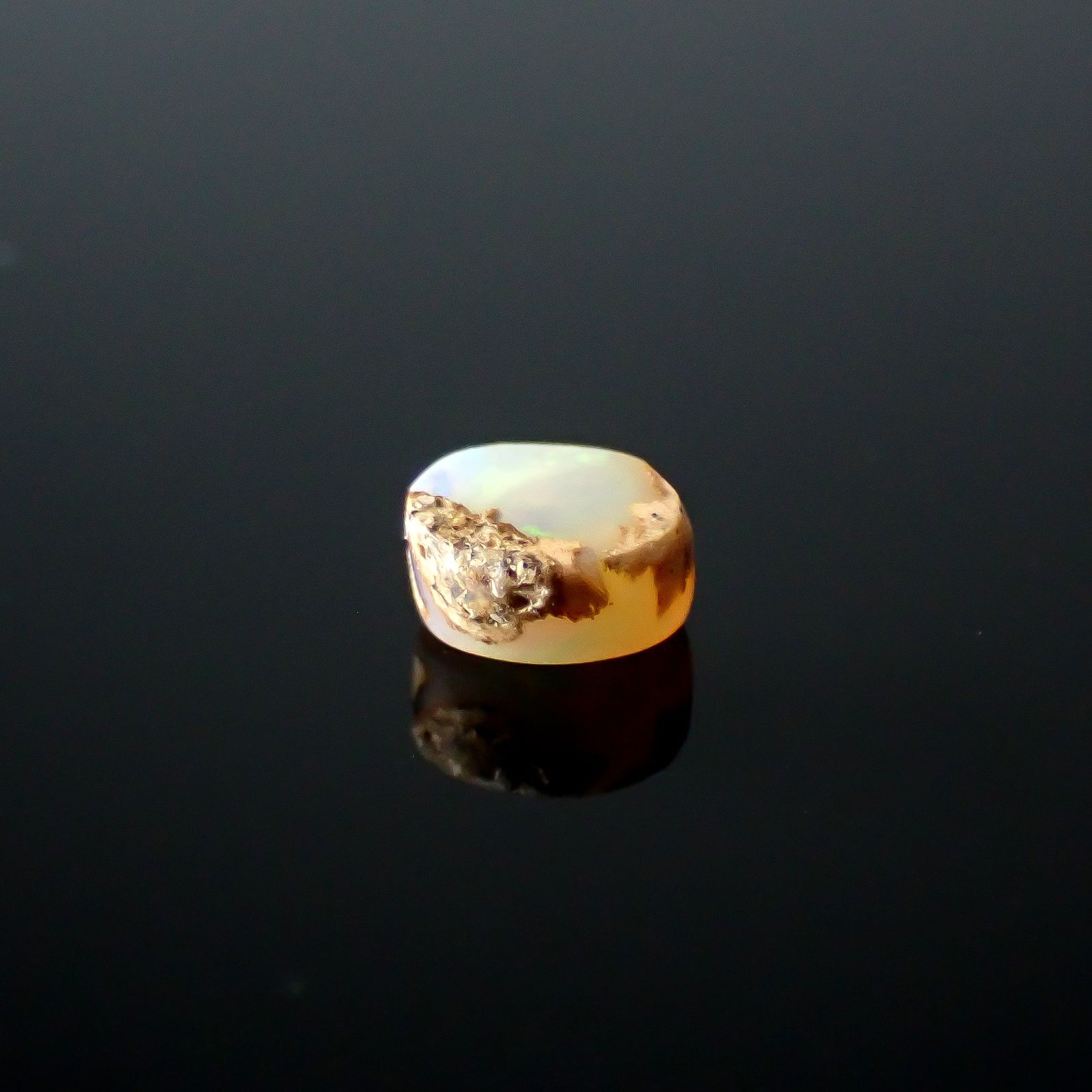 ウッドオパール オーストラリア産 0.32ct / 4.7x3.9mm前後 [251031197]