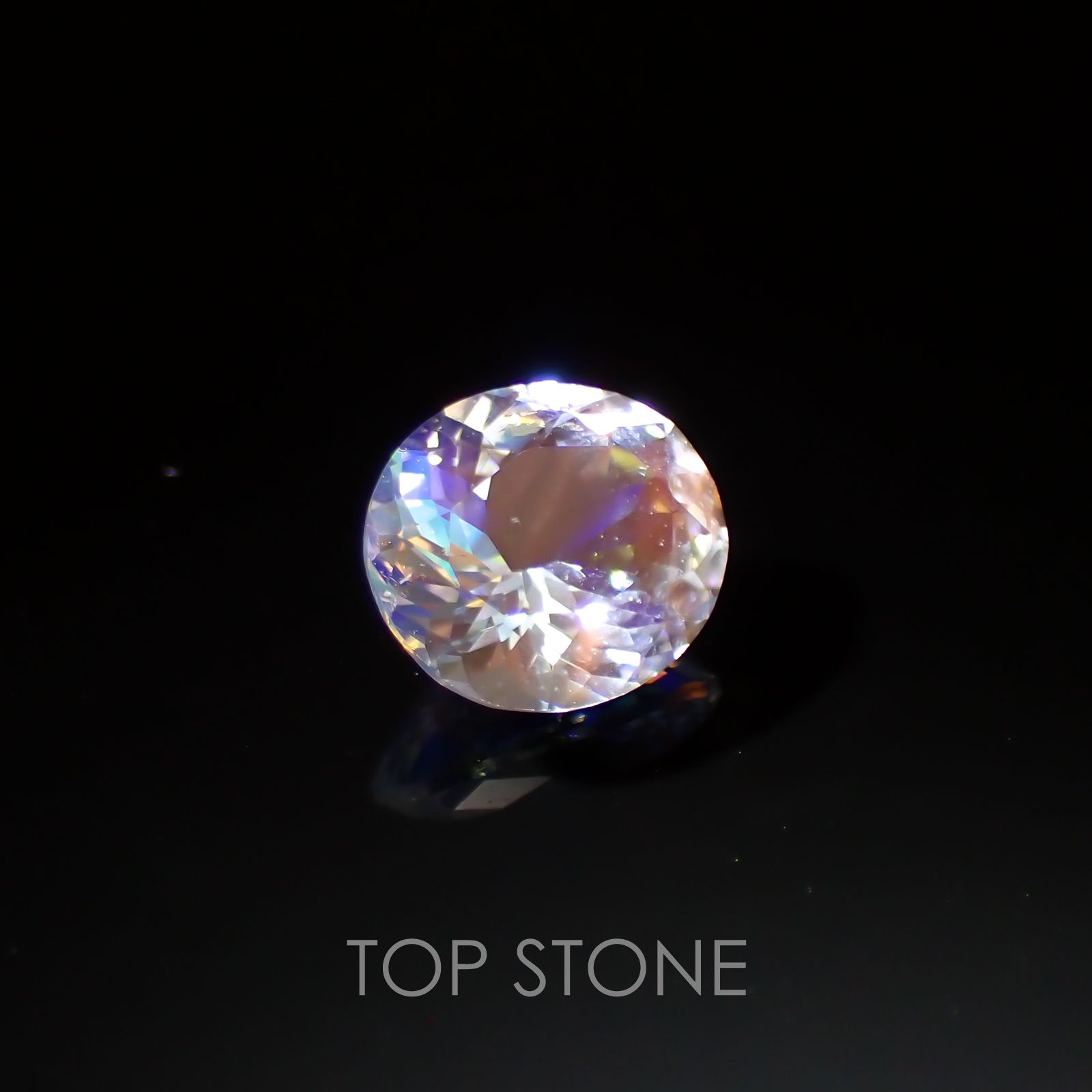 レインボームーンストーン(アンデシンラブラドライト) マダガスカル産 ルース 0.83ct[210310127]6.9×6.1mm前後