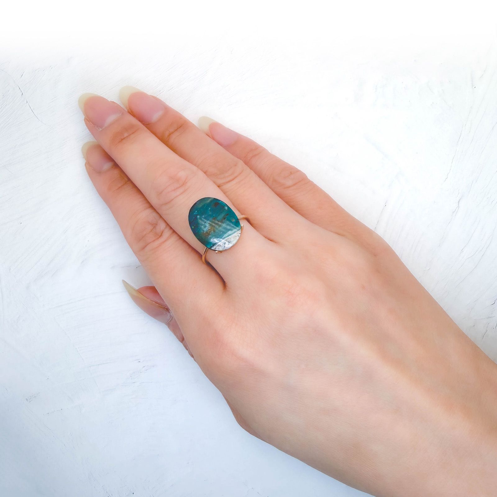 ブルーオパール ペルー産 6.14ct / 15.6x12.3mm前後 [260933089]