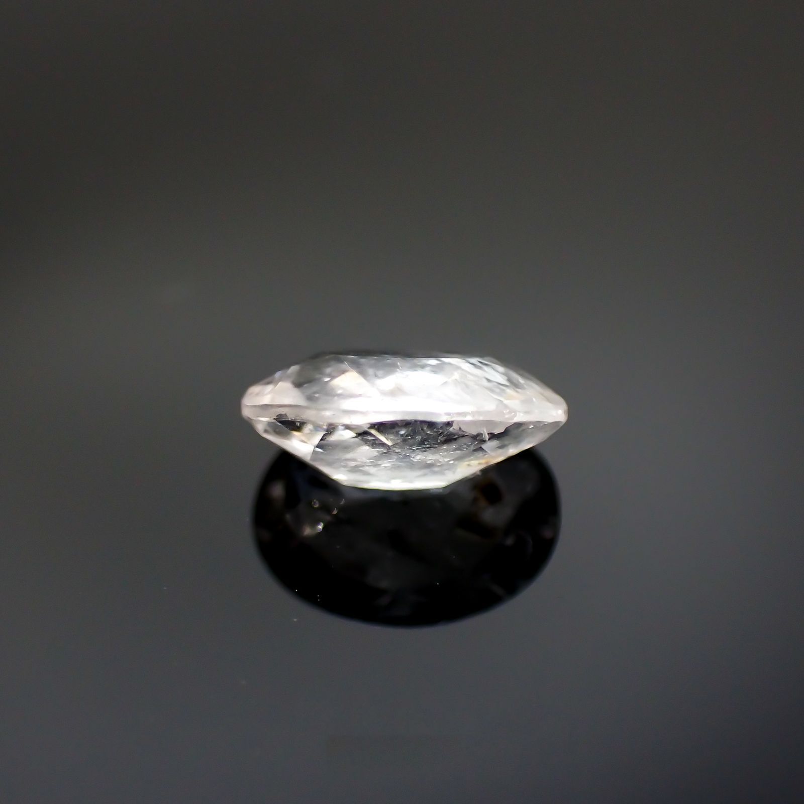 ユークレース(宝石名ユークレース)ブラジル産 0.838ct ソ付(彩珠)[230522044]7.3x5.3mm前後