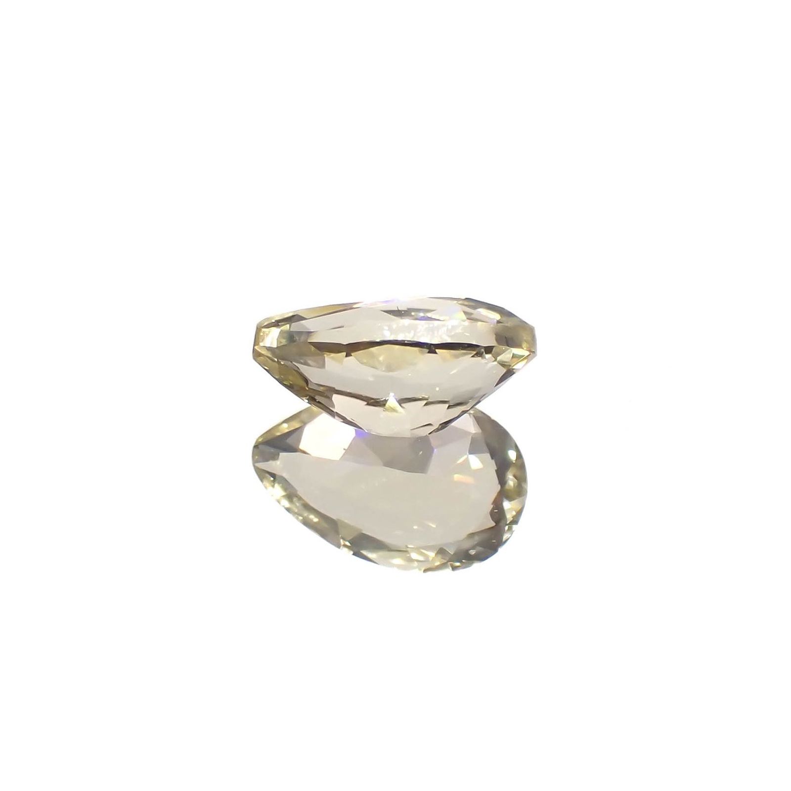 イエロースキャポライト(宝石名イエロー・スキャポライト)タンザニア産 識別済 0.85ct / 8x5.1mm前後 [221219402]