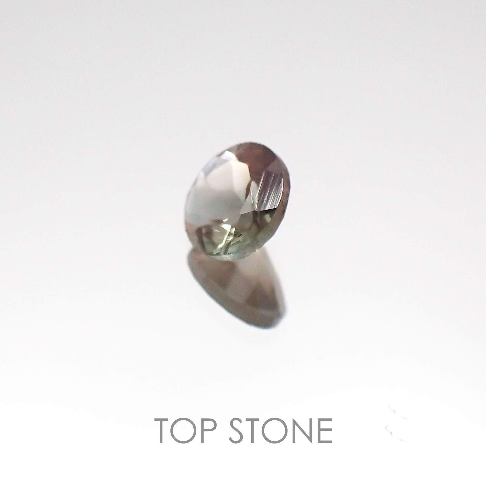 バイカラーオレゴンサンストーン アメリカ産 ルース 0.43ct[20107094]5.2×5.2mm前後