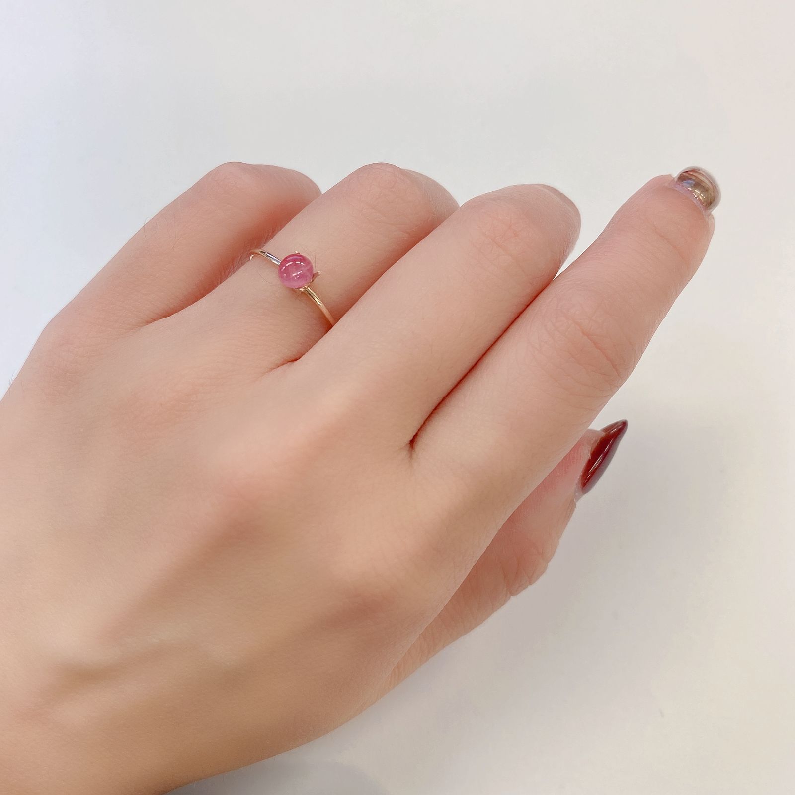 ペツォッタイトキャッツアイ(ラズベリル)(宝石名ペツォッタイト・キャッツアイ) マダガスカル産 0.495ct ソ付(彩珠)[210811975]5×4.4mm前後