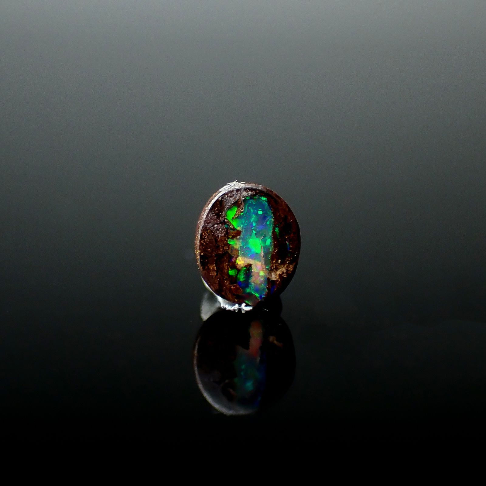 ウッドオパール オーストラリア産 0.15ct / 4.1x3.6mm前後 [251131298]