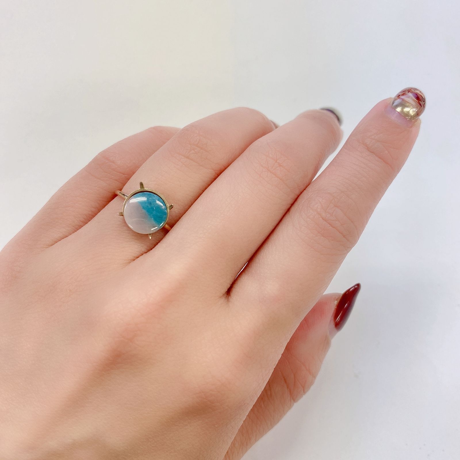パライバトルマリンインクォーツ(宝石名トルマリンインクォーツ/別名パライバ・トルマリンインクォーツ) ブラジル産 1.929ct ソ付(宝貴協)[210812961]9.1×9.0mm前後