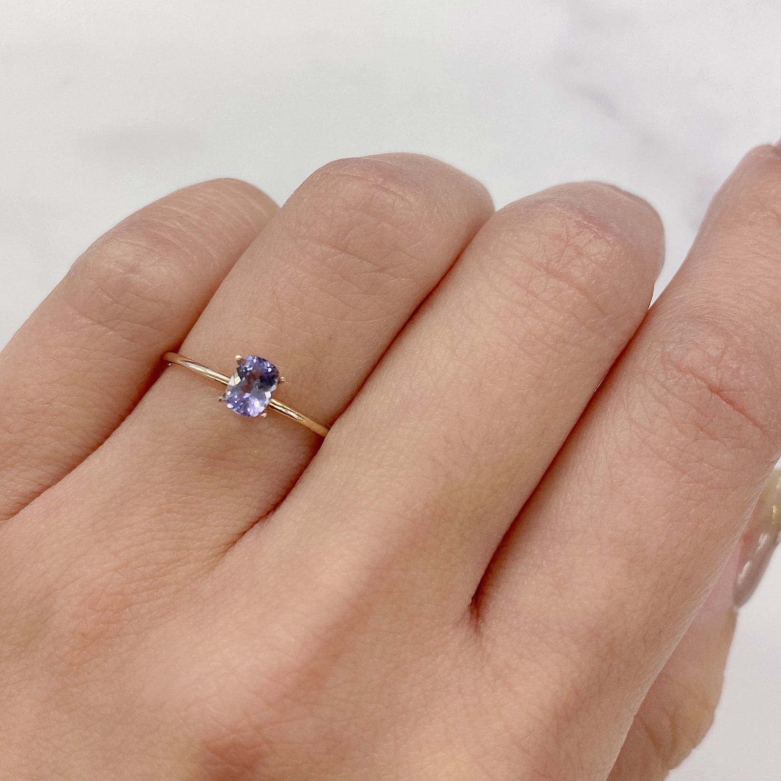 マリアライトフルオレッセンス(宝石名パープル・スキャポライト) スリランカ産 0.28ct 識別済[21019557]4.9×3.8mm前後