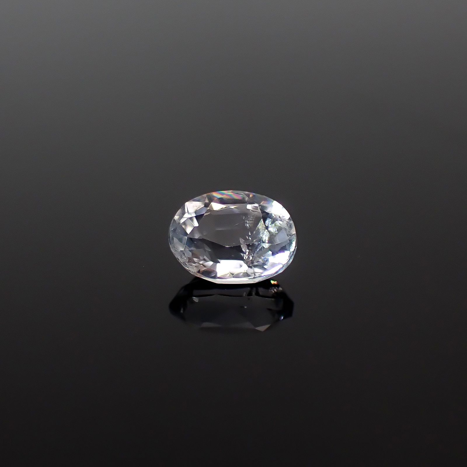 テネブレッセンススキャポライト アフガニスタン産 0.25ct / 4.7x3.6mm前後 [260432044]