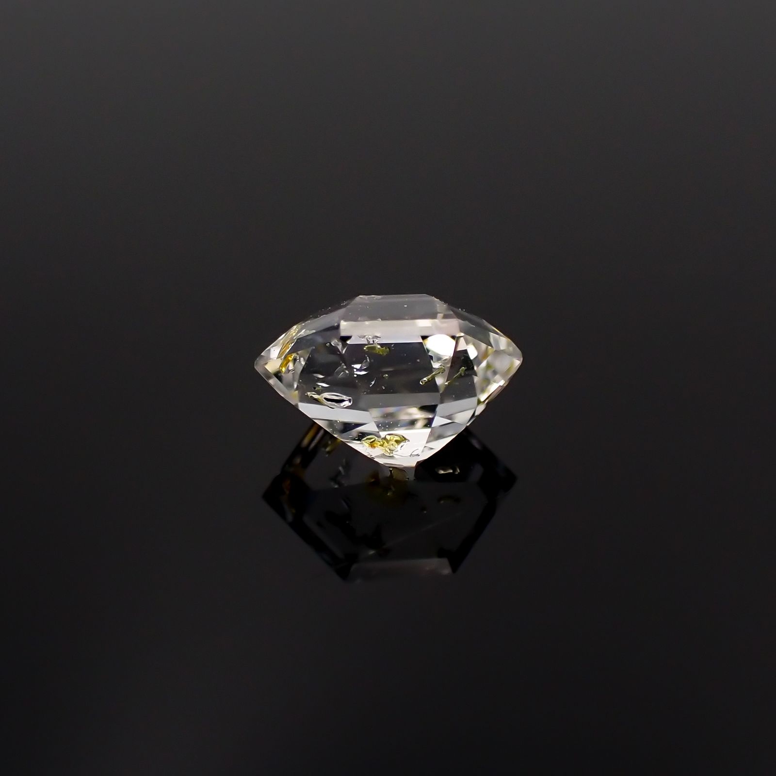 ◇カスタムカット◇オイルインクォーツ パキスタン産 0.64ct [230522096]6.6x4.7mm前後