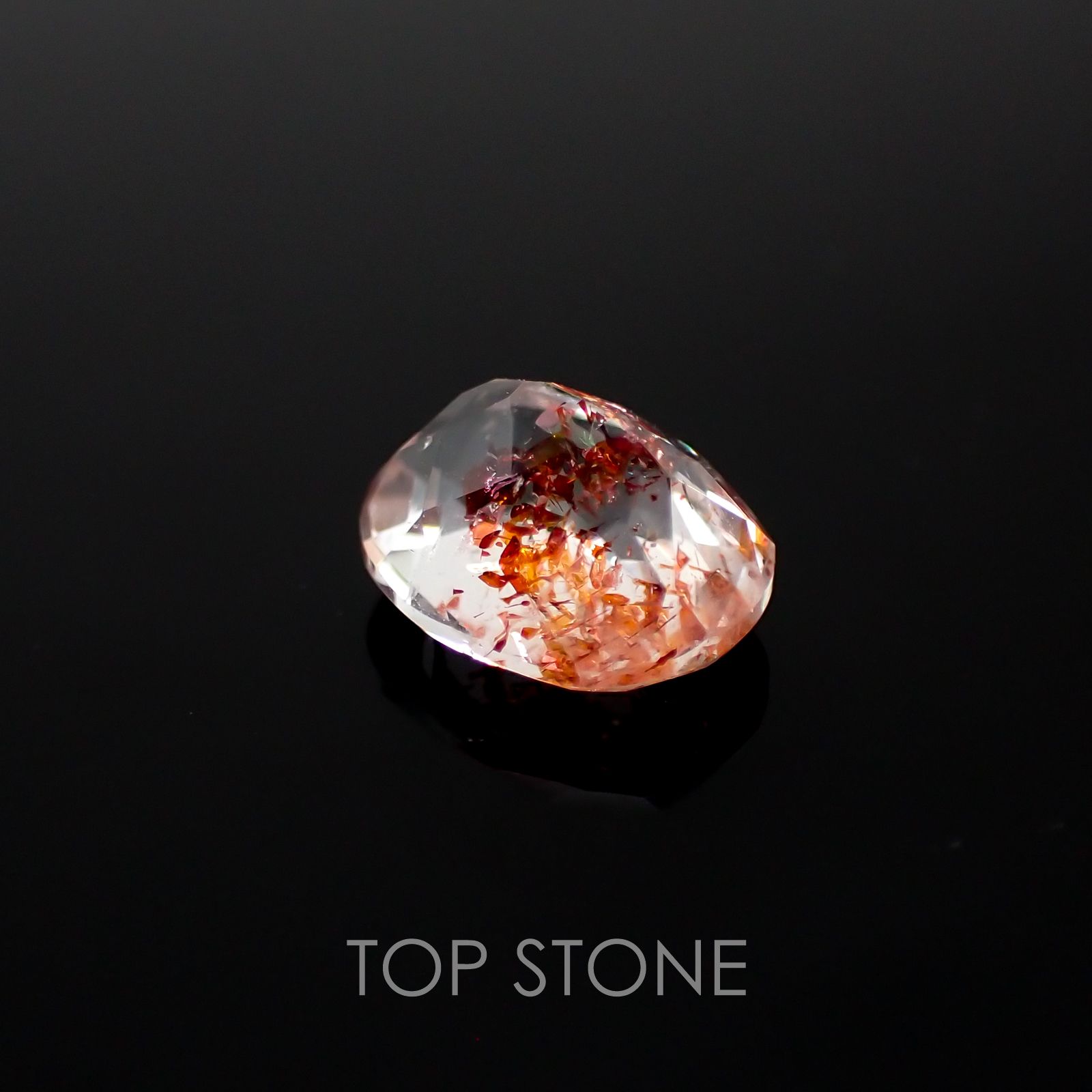 ファイヤークォーツ ナイジェリア産 ルース 1.41ct[210410207]7.9×6.5mm前後