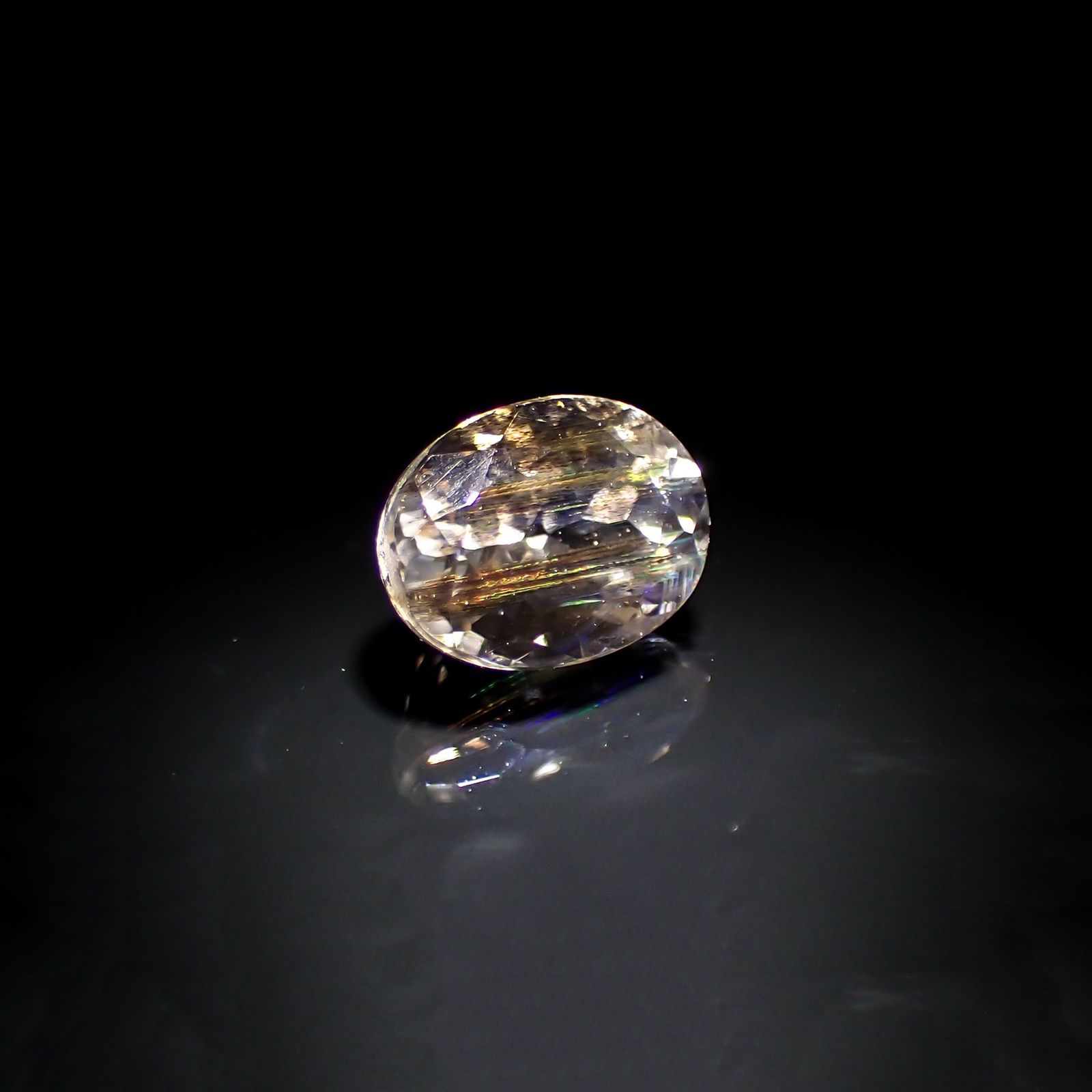 レインボースキャポライト(宝石名イリデッセント・スキャポライト) ブラジル産 識別済 1.42ct / 8.1×6mm前後 [210310340]