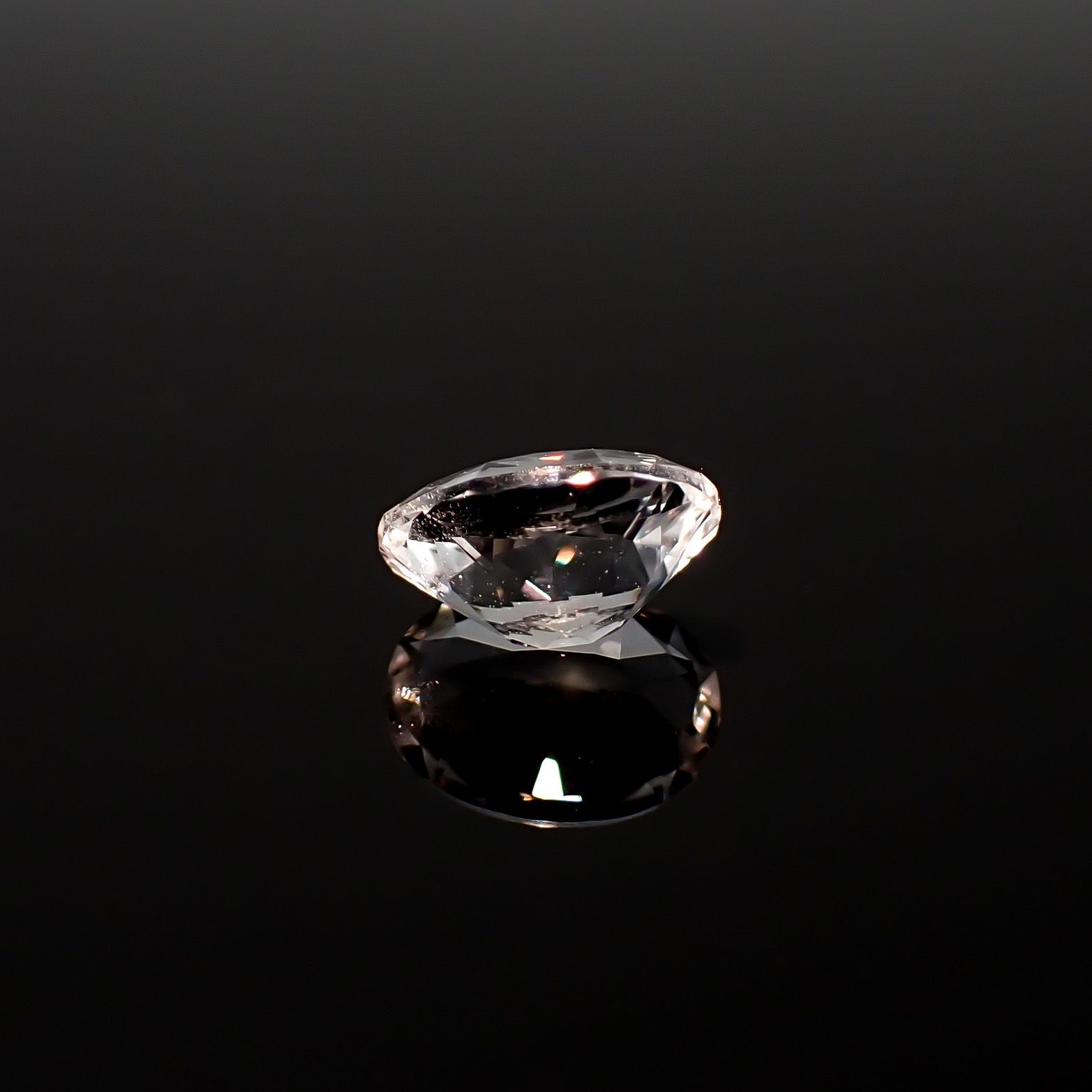 フェナカイト ロシア・マリシェボ鉱山産 0.82ct / 7x5.5mm前後 [260632431]