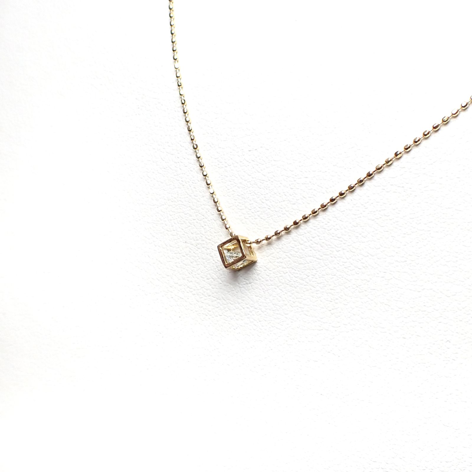 ◇K18 Reinette（レネット）◇アクアマリン | キューブボックスデザイン [チャーム/ペンダントトップ※チェーン別売り]