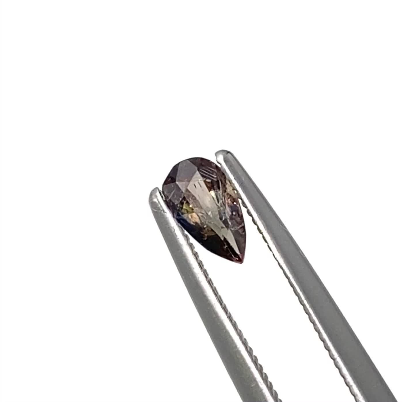 ブルーティントアキシナイト パキスタン産 0.29ct / 5.9x3.2mm前後