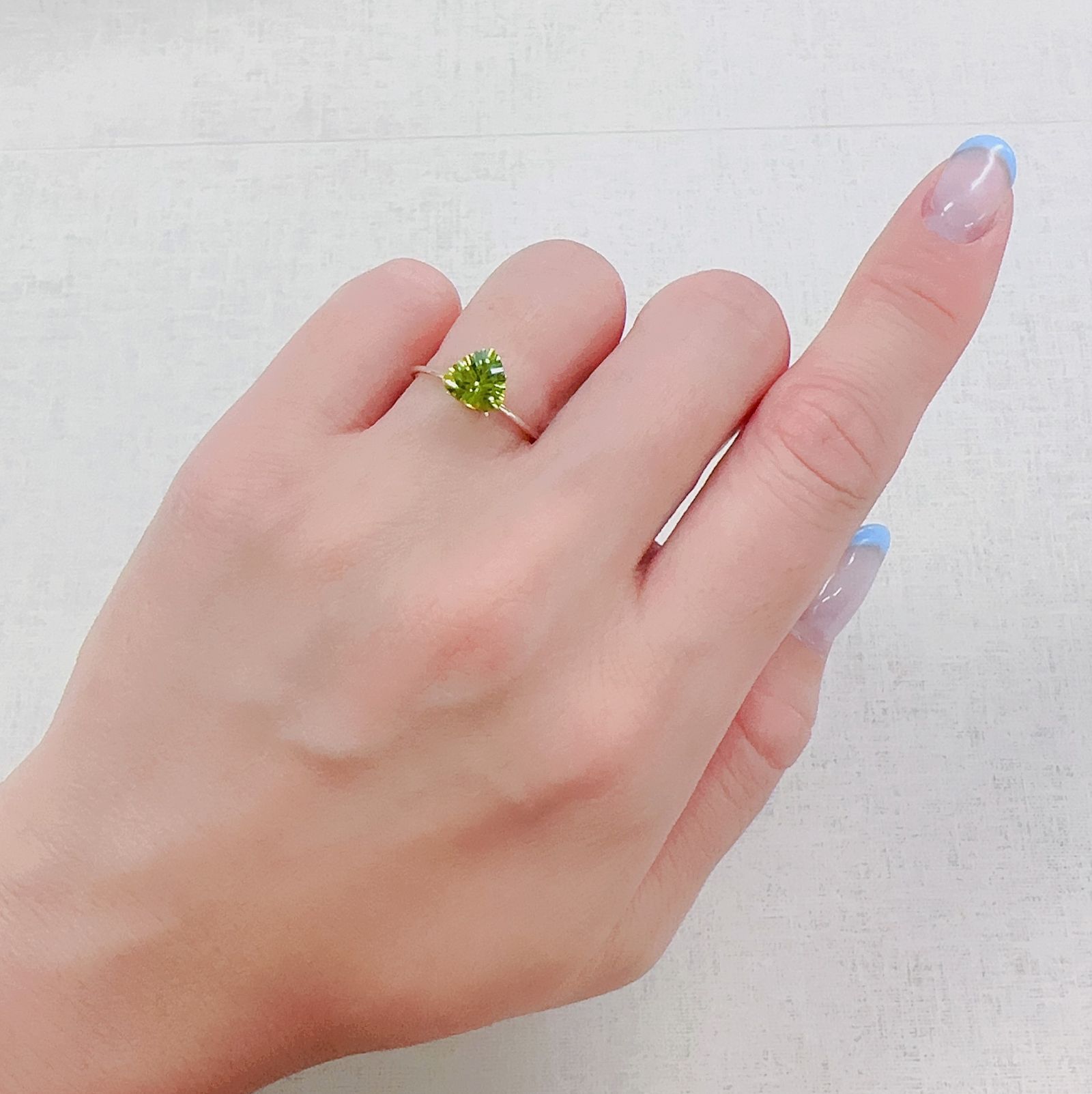◇コンケーブカット◇ペリドット 中国産 1.25ct[230622289]7x7.1mm前後