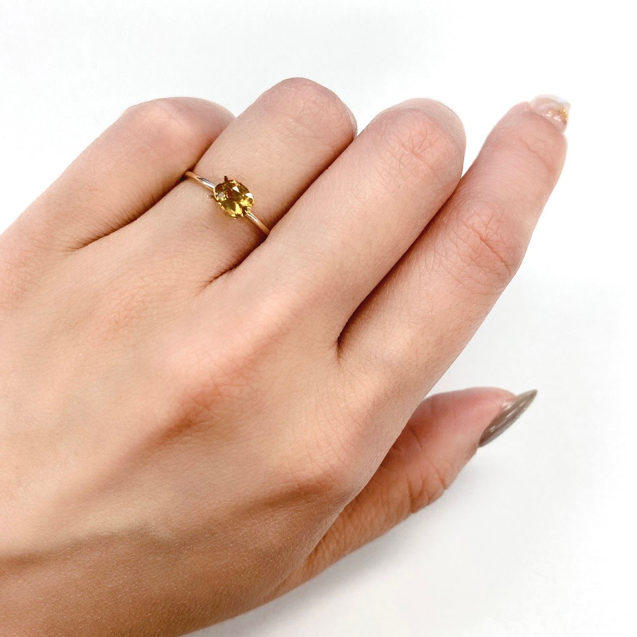 コンドロダイト  ソーティング付き パキスタン産 ルース 0.597ct[21059605]5.5×4.5mm前後