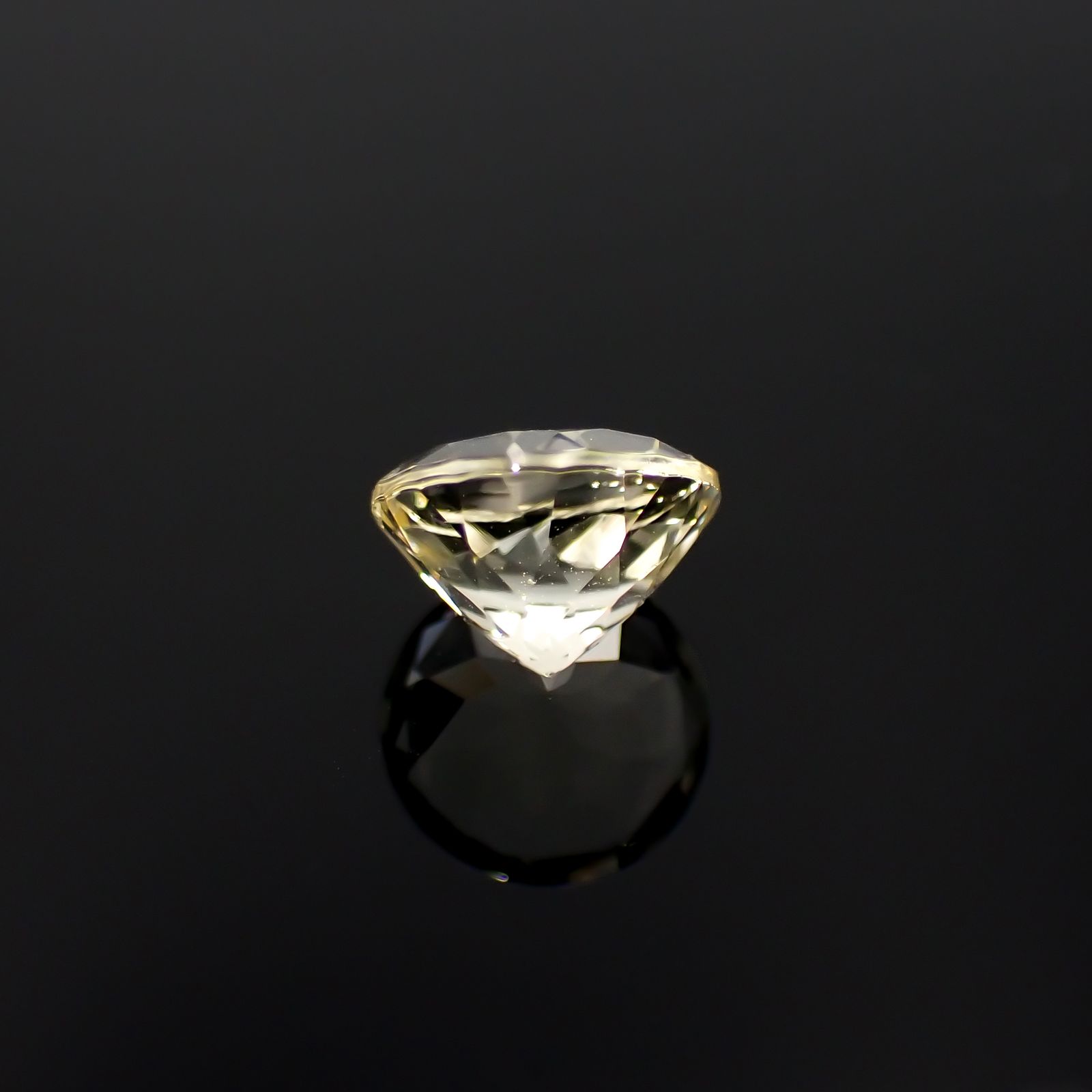 イエロースキャポライト フルオレッセンス(宝石名スキャポライト)タンザニア産 1.16ct 識別済[230722657]7.1x7mm前後