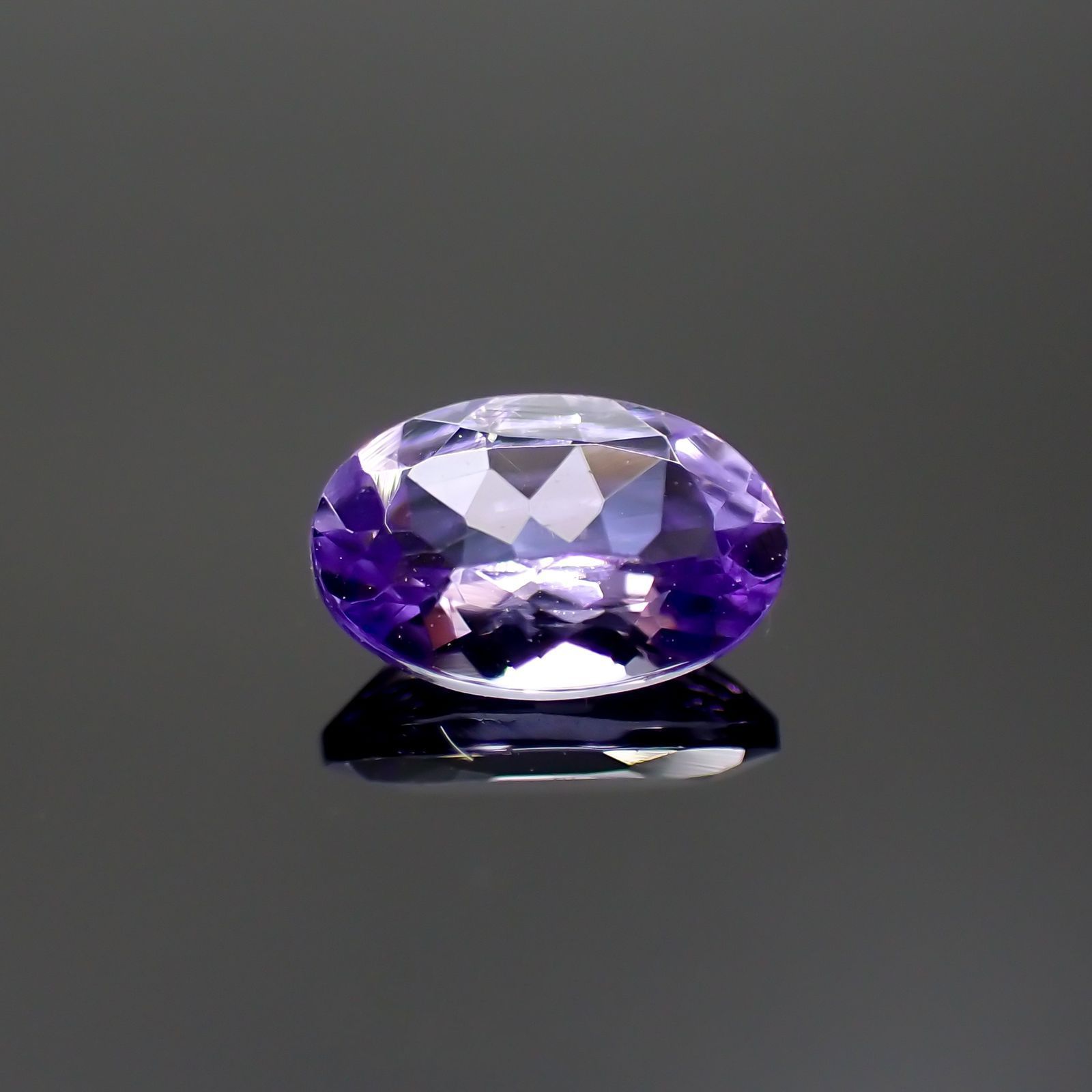 バイオレットゾイサイト(宝石名バイオレット・ゾイサイト)タンザニア産 0.447ct ソ付(彩珠)[231124107]6.1x4mm前後