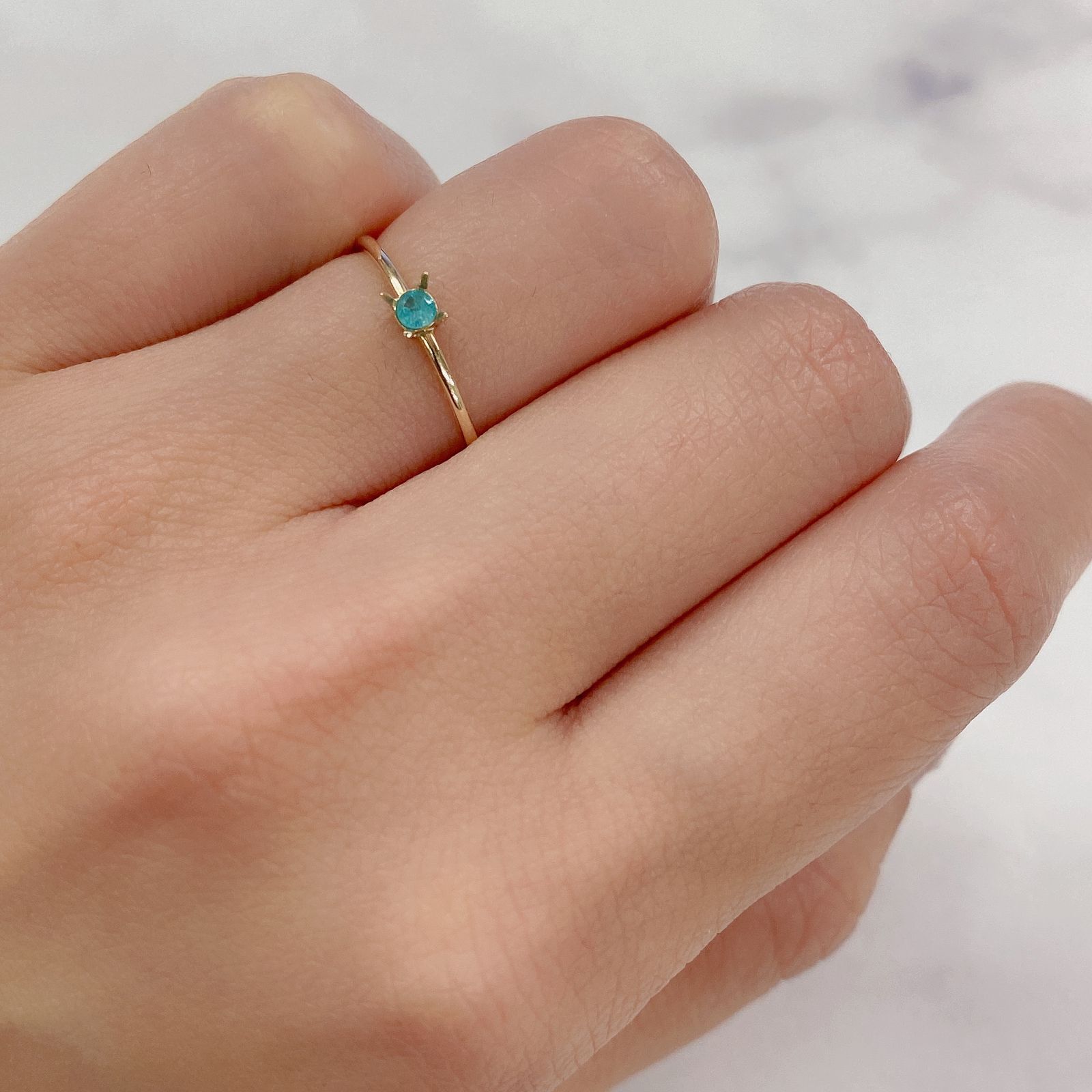 パライバトルマリン(宝石名トルマリン/別名パライバ・トルマリン) ブラジル・パライバ州バターリャ鉱山産 0.053ct 識別済[20106255]2.4×2.4mm前後