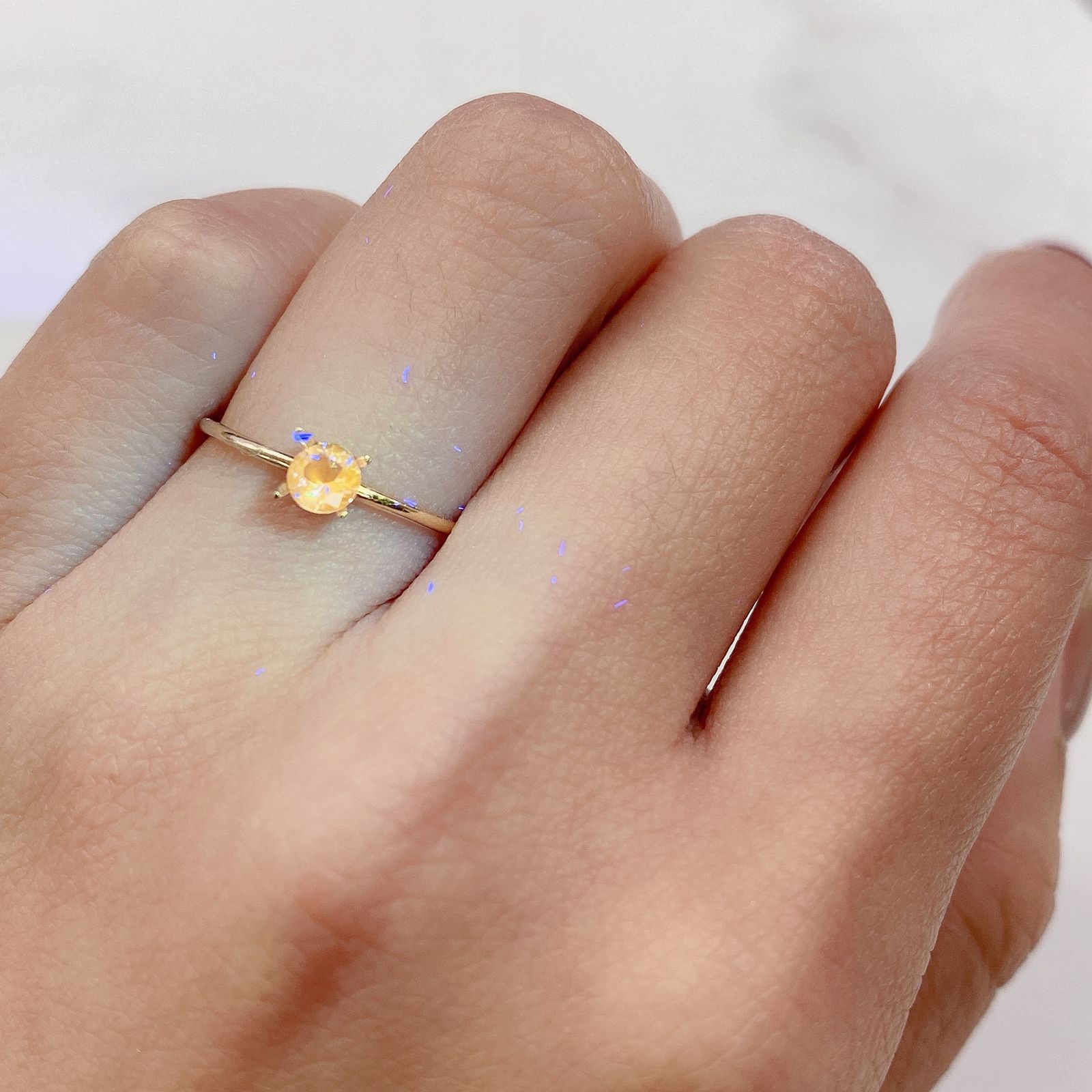 マリアライトフルオレッセンス(宝石名パープル・スキャポライト) スリランカ産 0.18ct 識別済[21049564]4×4mm前後