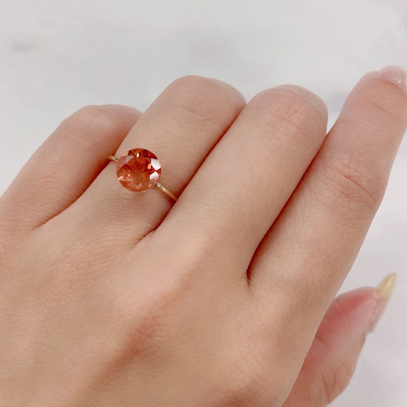 オレゴンサンストーン(宝石名ラブラドライト・サンストーン) アメリカ・オレゴン州産 1.733ct ソ付(彩珠)[21019352]8×8mm前後