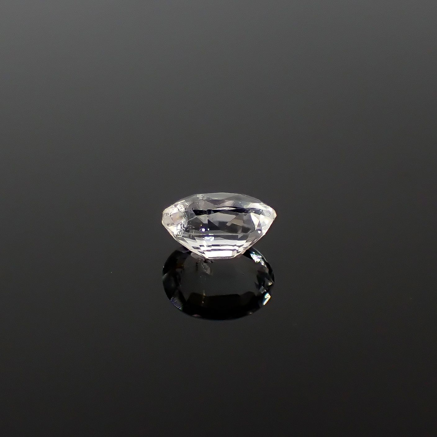 テネブレッセンススキャポライト アフガニスタン産 0.25ct / 4.7x3.6mm前後 [260432044]