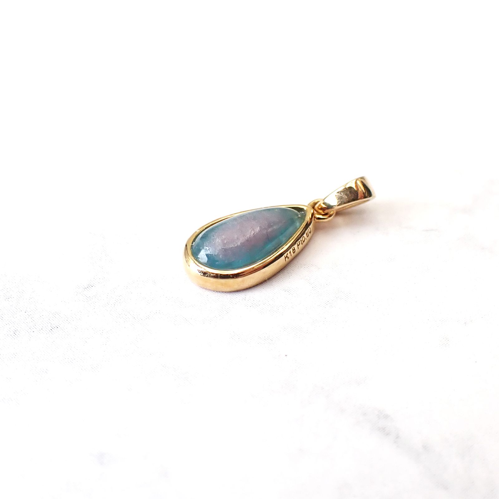 ◇K18ペンダント◇ バイカラーパライバトルマリン ブラジル・バターリャ鉱山産 0.60ct | 手巻き枠 つやあり 5.4x9mm(※チェーン別売り) [241229431]