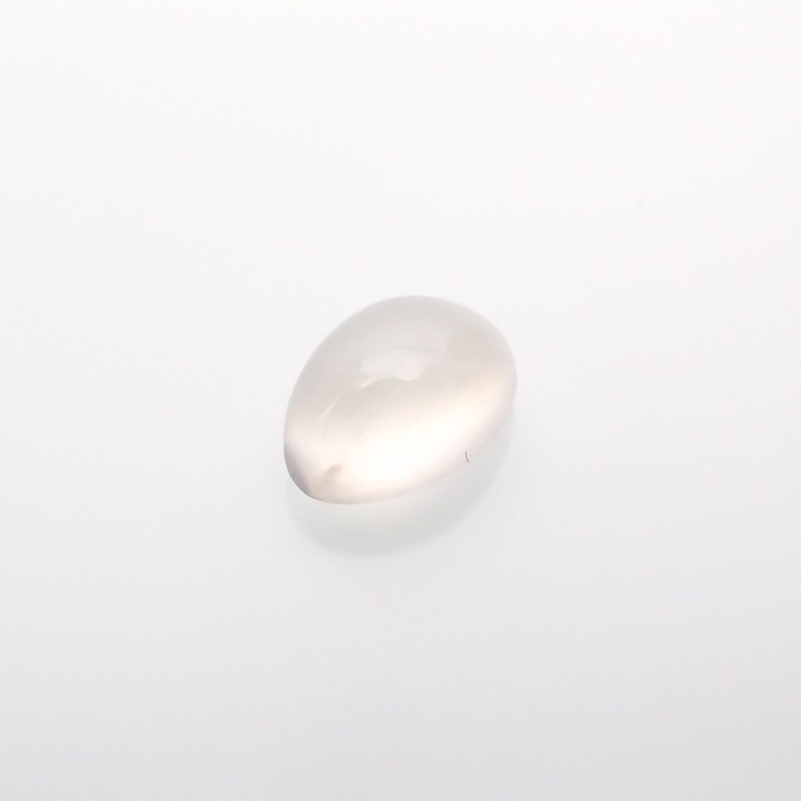 ムーンストーンキャッツアイ(宝石名ムーンストーン・キャッツアイ)インド産 識別済 0.58ct / 6x3.9mm前後 [220515789]