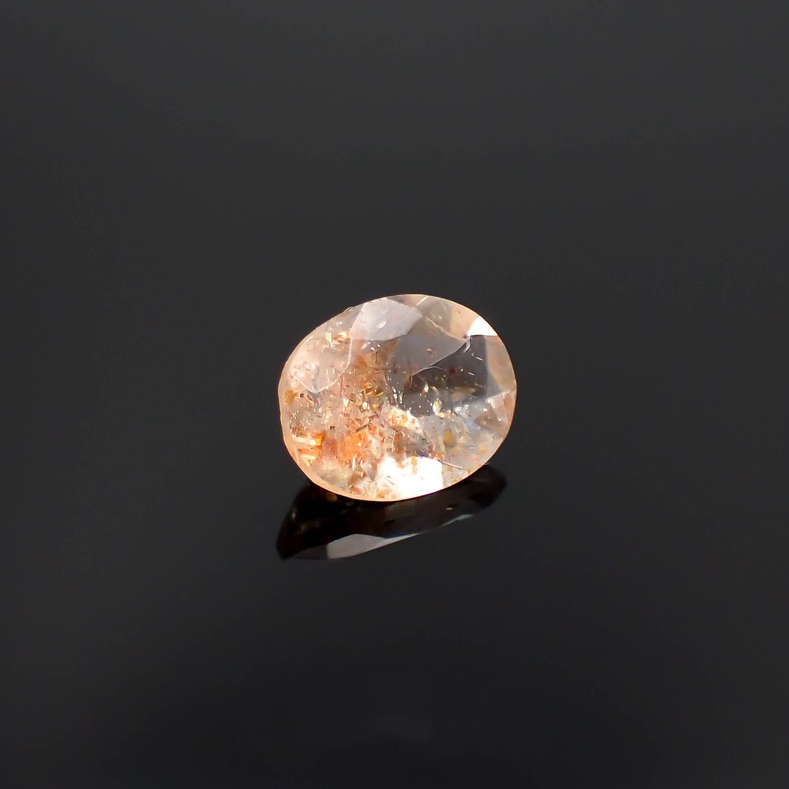 イリュージョンサンストーン タンザニア産 1.59ct / 9x7.1mm前後 [230120119]