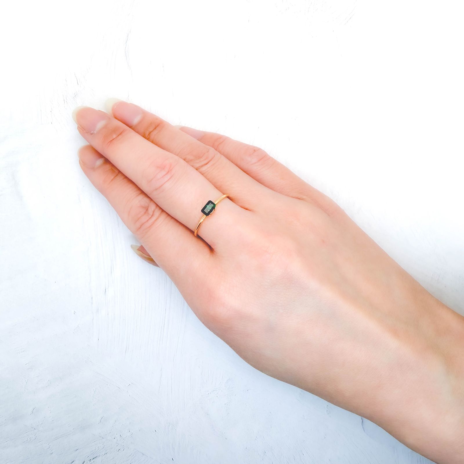 パイライトインエメラルド コロンビア産 0.25ct / 5x3mm前後 [260532127]