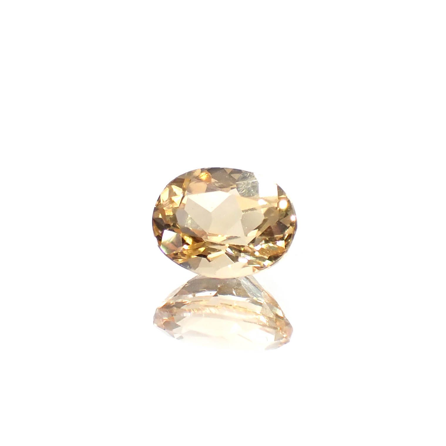 インペリアルトパーズ(宝石名トパーズ)ブラジル産 0.78ct / 6.2x4.9mm前後 [250630493]