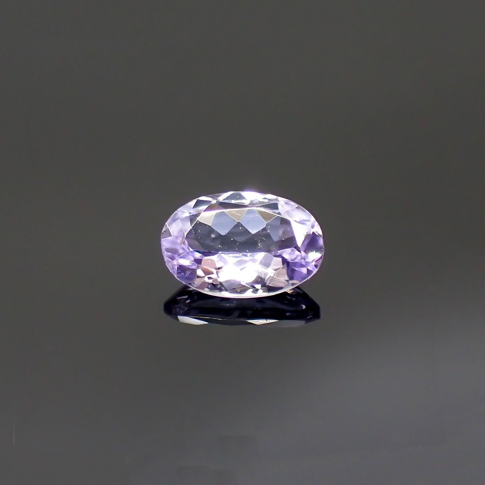 バイオレットゾイサイト(宝石名バイオレット・ゾイサイト)タンザニア産 識別済 0.39ct / 5.8x3.9mm前後 [220114945]
