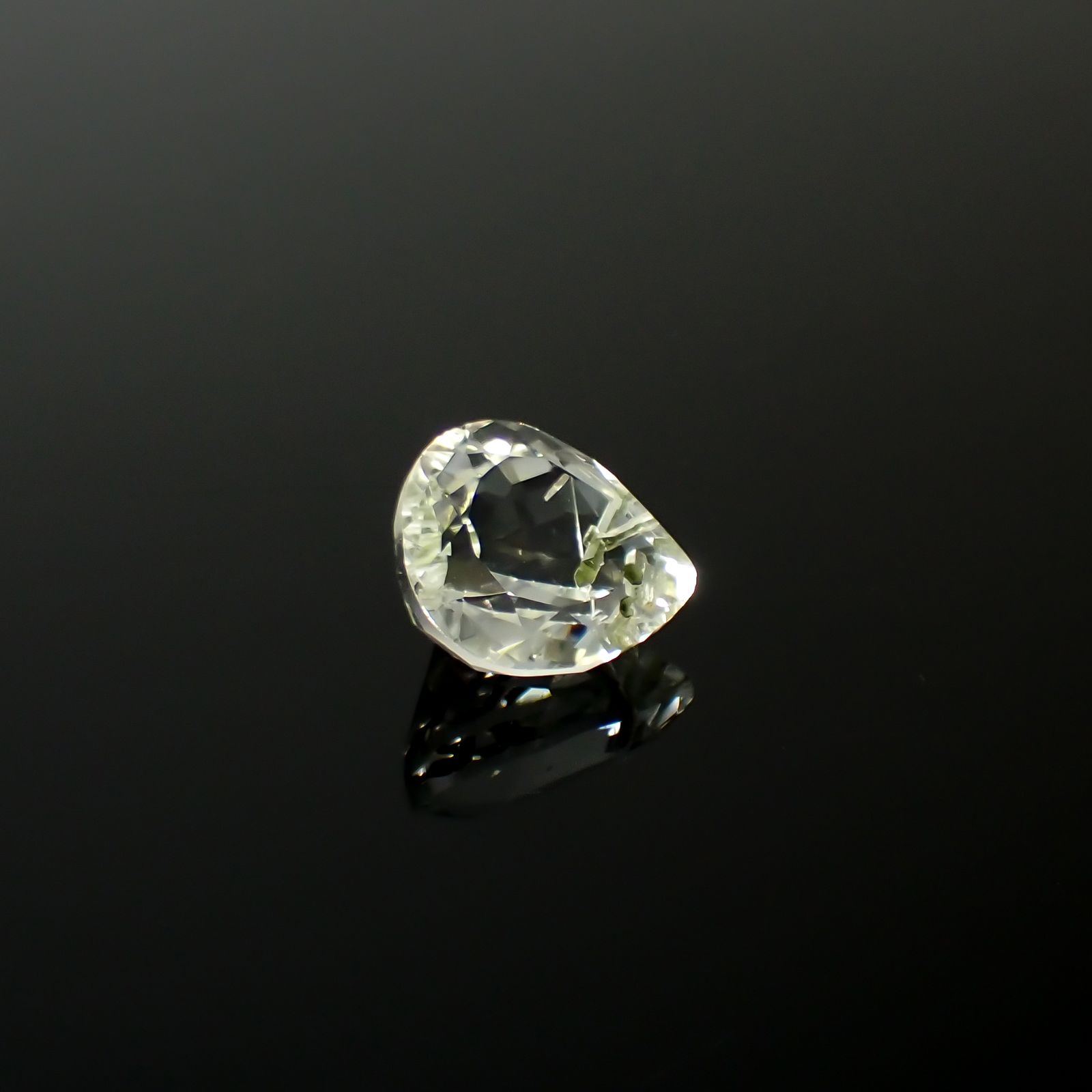 アパタイトイントパーズ(宝石名アパタイト イン トパーズ)ブラジル産 15.74ct 識別済[240225927]16.2x13.8mm前後