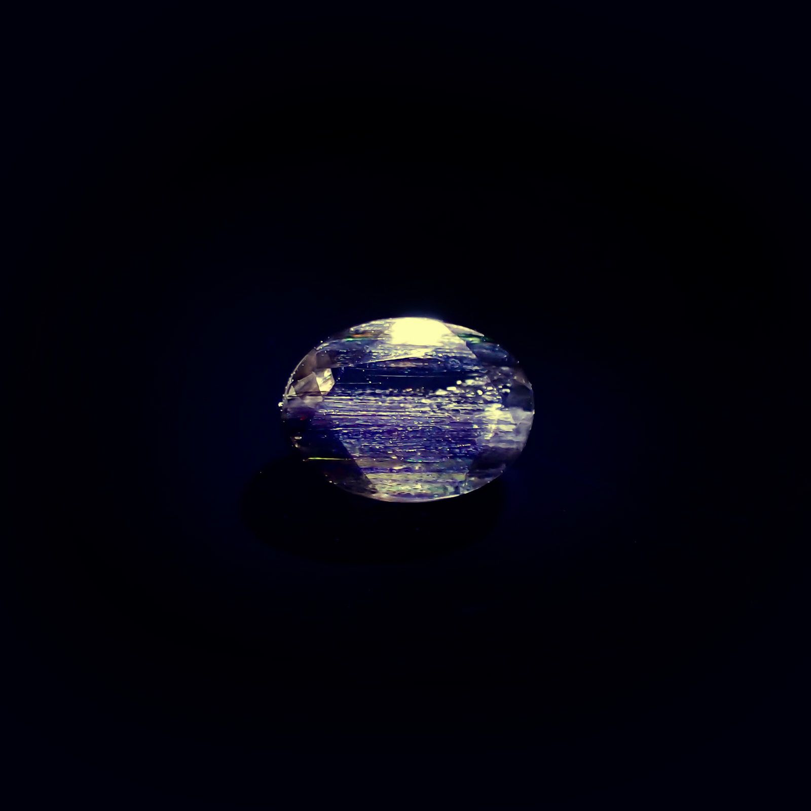 レインボースキャポライト ブラジル産 0.77ct / 7.4x5.4mm前後 [260825058]