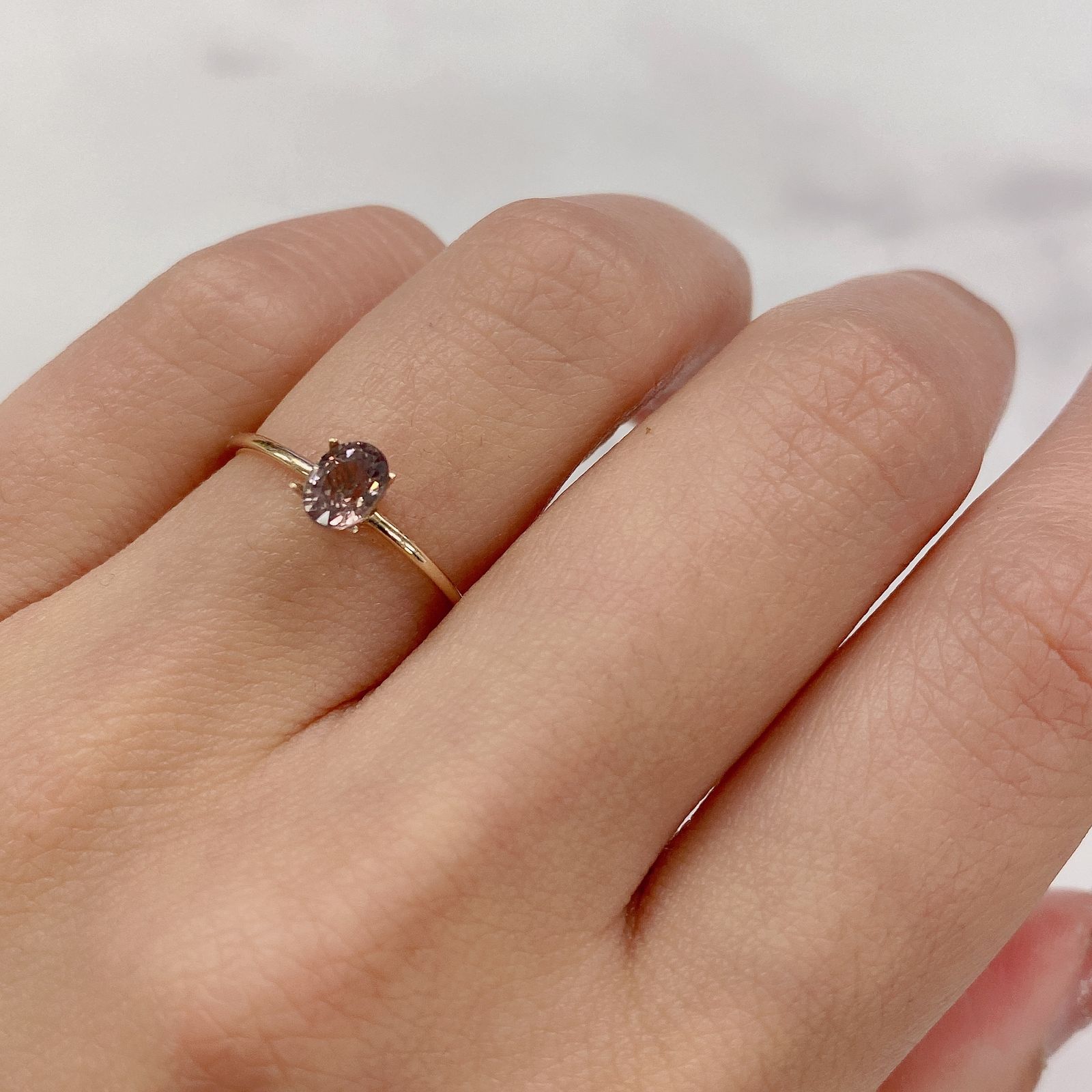 カラーチェンジマラヤガーネット(宝石名ガーネット) タンザニア産 0.57ct 識別済[21029646]5.3×4.5mm前後