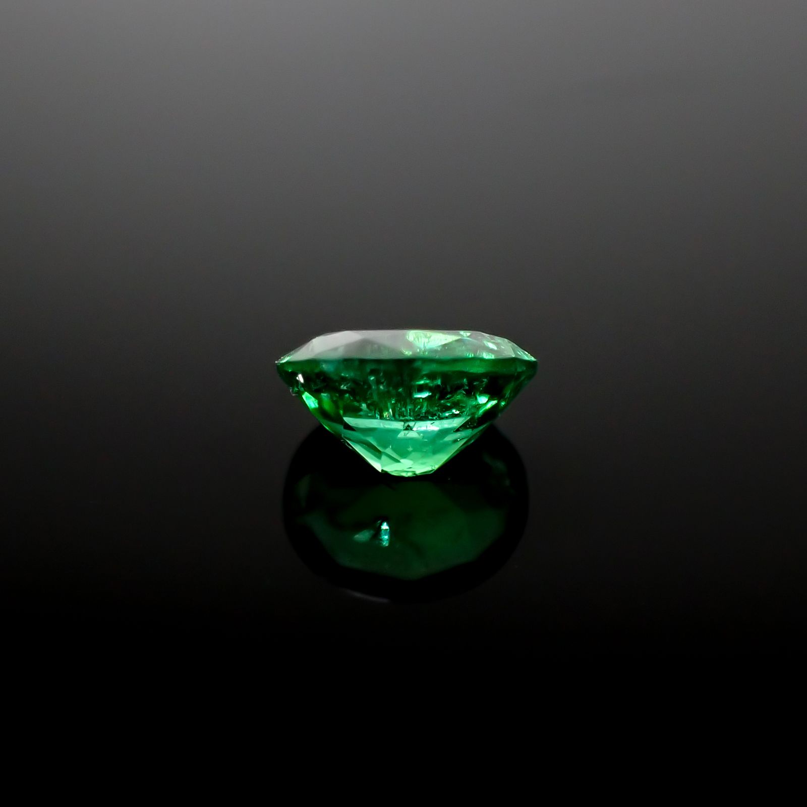 パライバトルマリン(宝石名トルマリン/別名パライバ・トルマリン)ブラジル・キントス鉱山産 0.578ct ソ付(宝貴協)[240928715]5.87x4.98mm前後