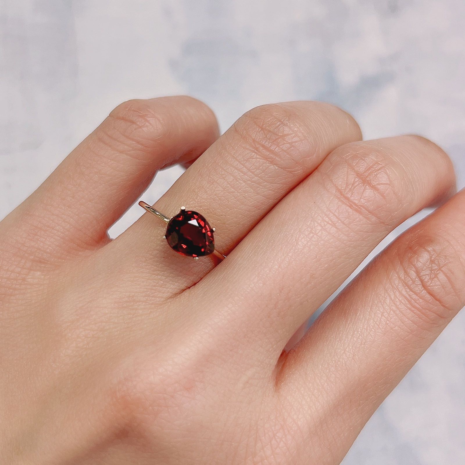 アルマンディンスペサルティンガーネット(宝石名アルマンディン スペサルティン・ガーネット) マダガスカル産 2.516ct ソ付(彩珠)[21018106]8.1×6.9mm前後