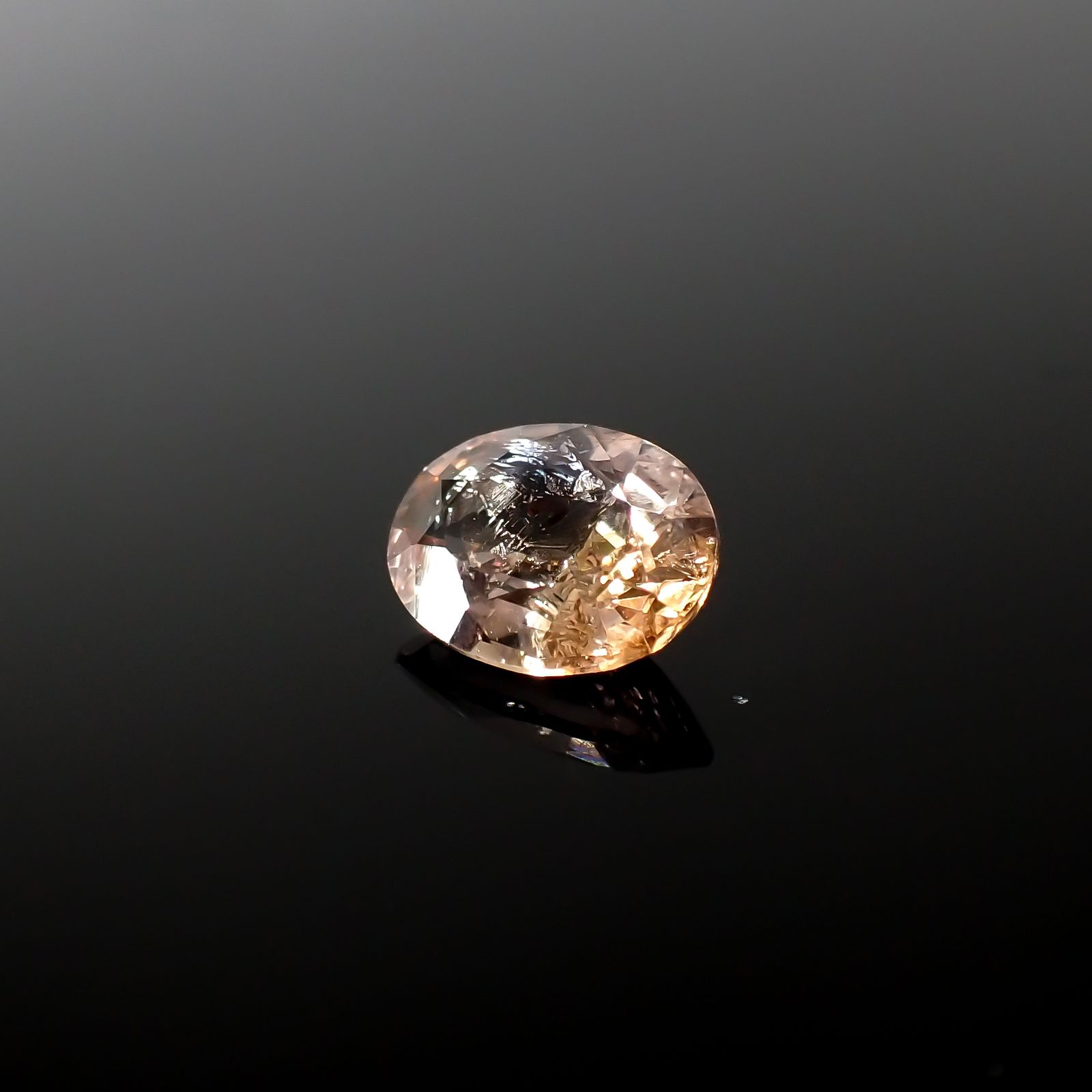マグネシオアキシナイト フルオレッセンス(宝石名マンガン/マグネシオ・アキシナイト)タンザニア産 1.143ct ソ付(日独)[240327013]7.99x6.11mm前後