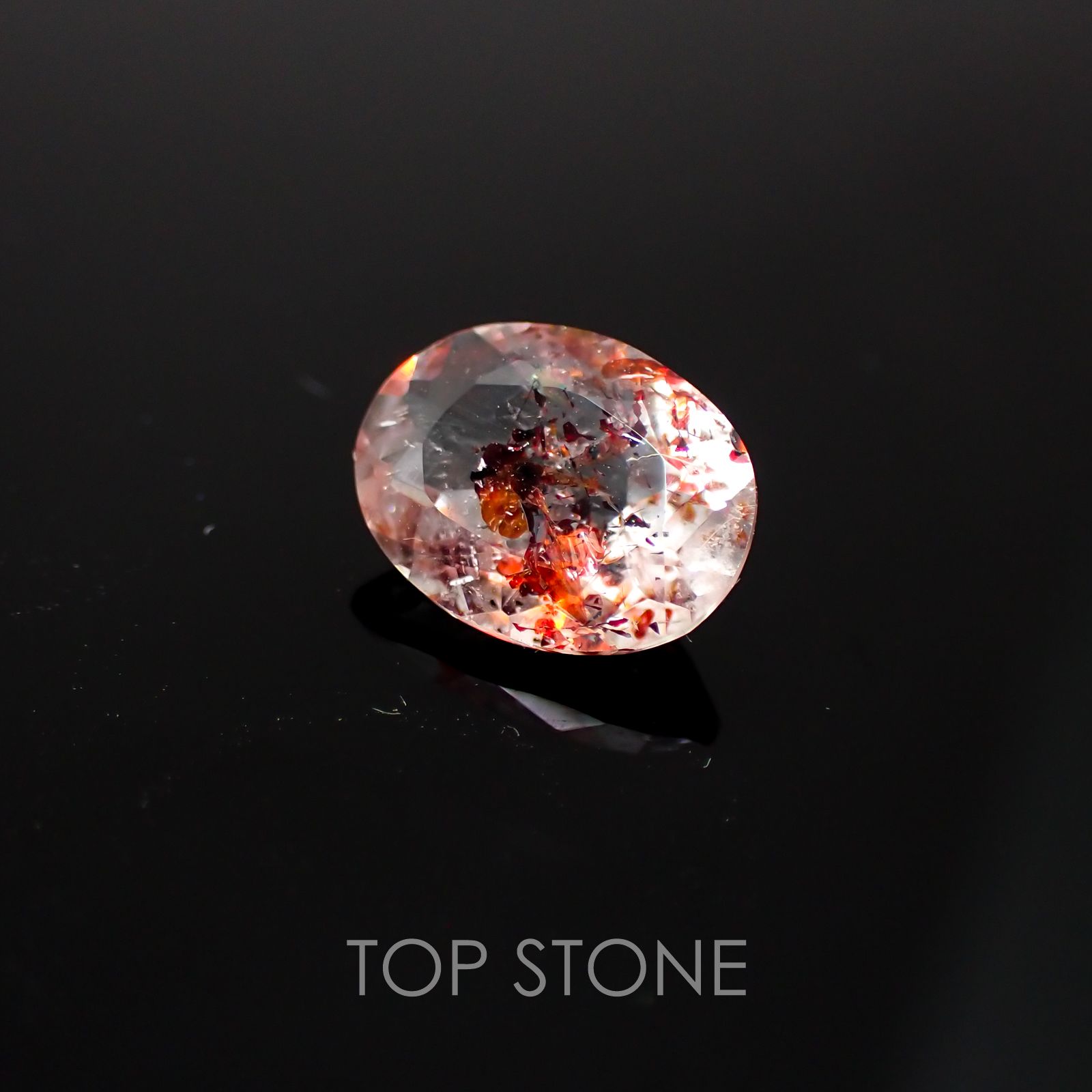 ファイヤークォーツ ナイジェリア産 ルース 1.47ct[210410204]9.1×6.9mm前後