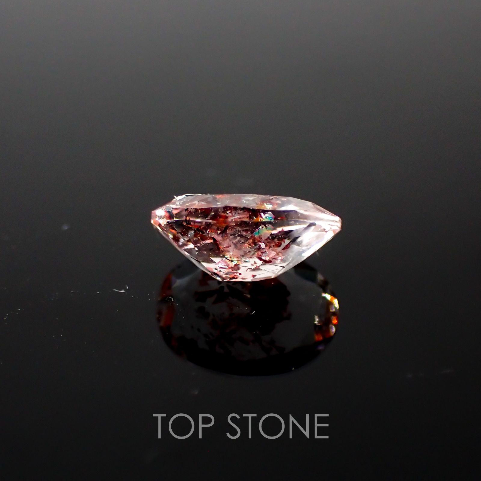 ファイヤークォーツ ナイジェリア産 ルース 1.47ct[210410204]9.1×6.9mm前後