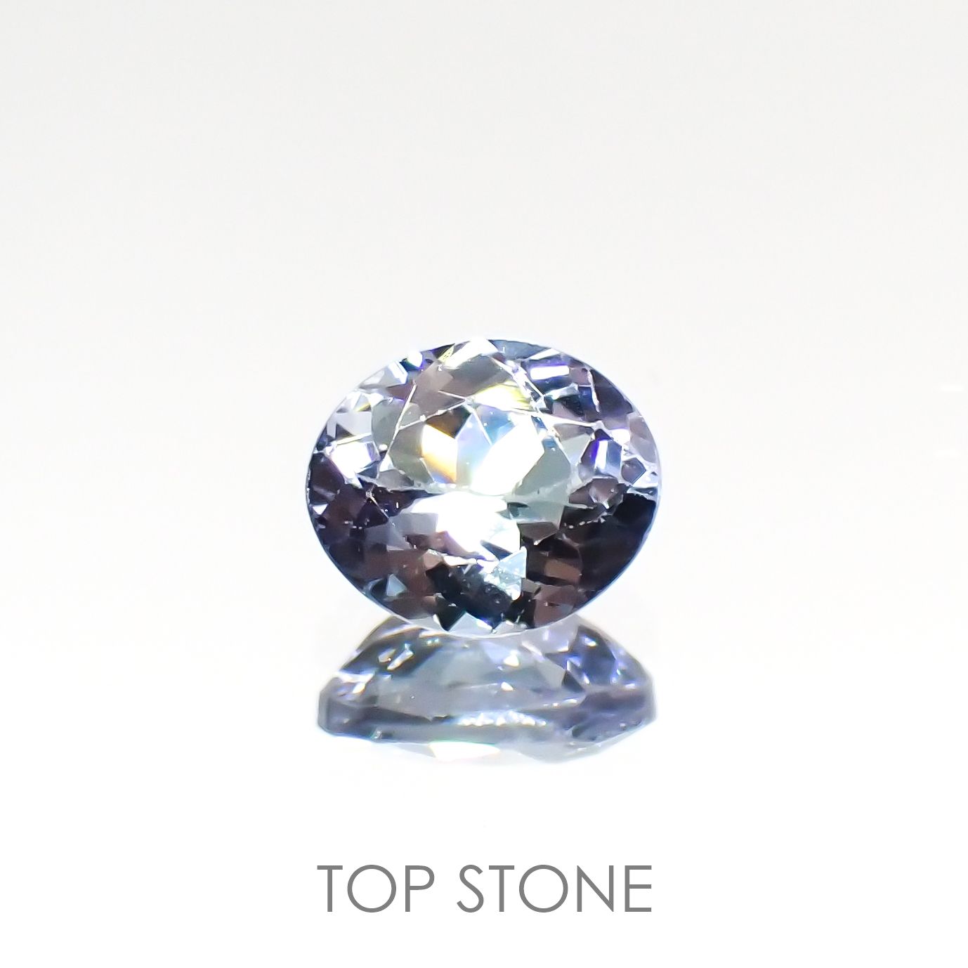 バイカラータンザナイト(宝石名バイカラー・ゾイサイト) タンザニア産 0.95ct 識別済[210912645]6.7×5.6mm前後