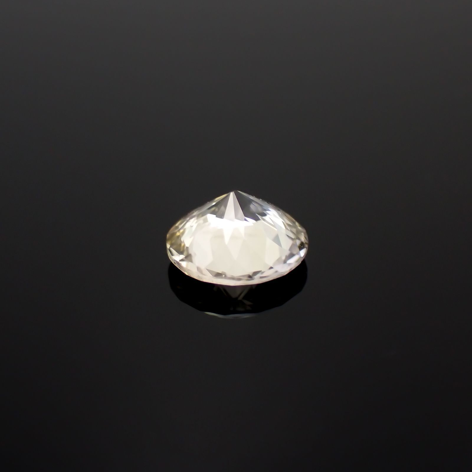 ゾイサイト 非加熱(宝石名ゾイサイト)タンザニア産 ソ付(彩珠) 0.951ct / 6.6x6.6mm前後 [221018873]