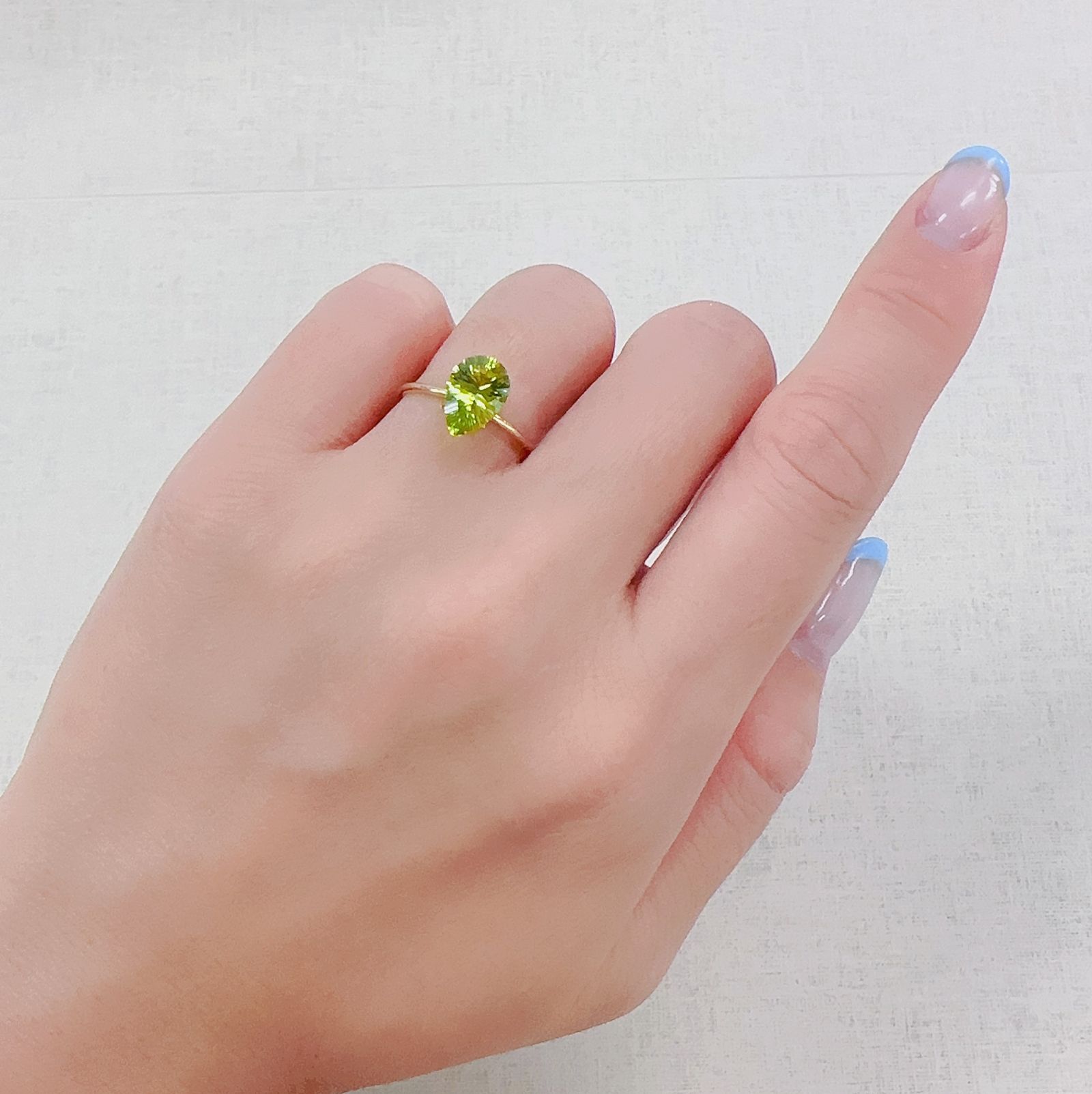 ◇コンケーブカット◇ペリドット 中国産 1.69ct[230622297]9.9x6.8mm前後