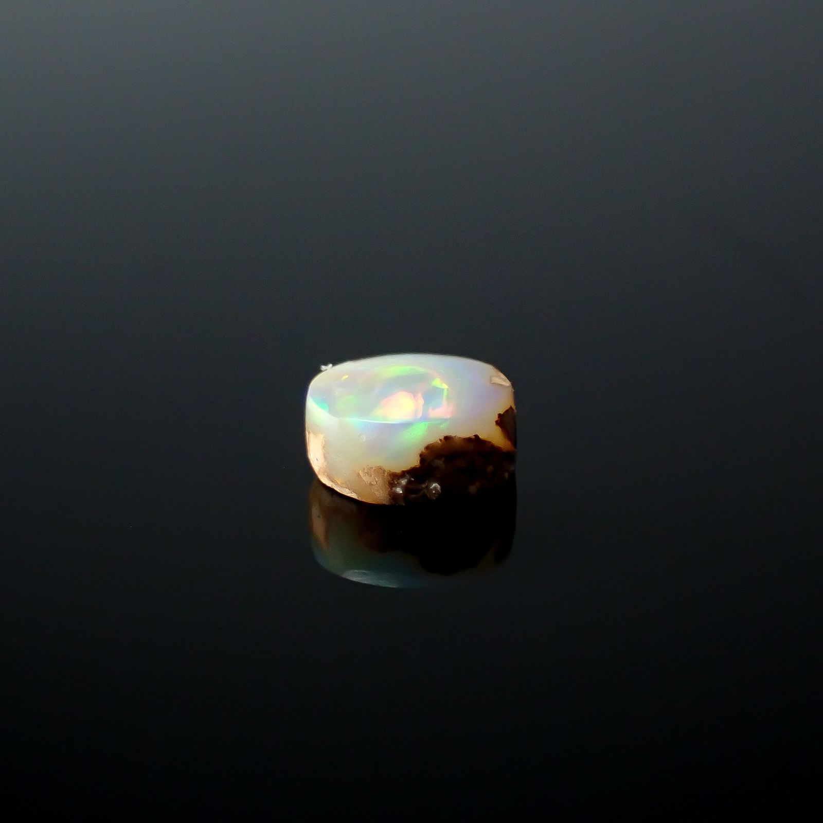 ウッドオパール オーストラリア産 0.32ct / 4.7x3.9mm前後 [251031197]