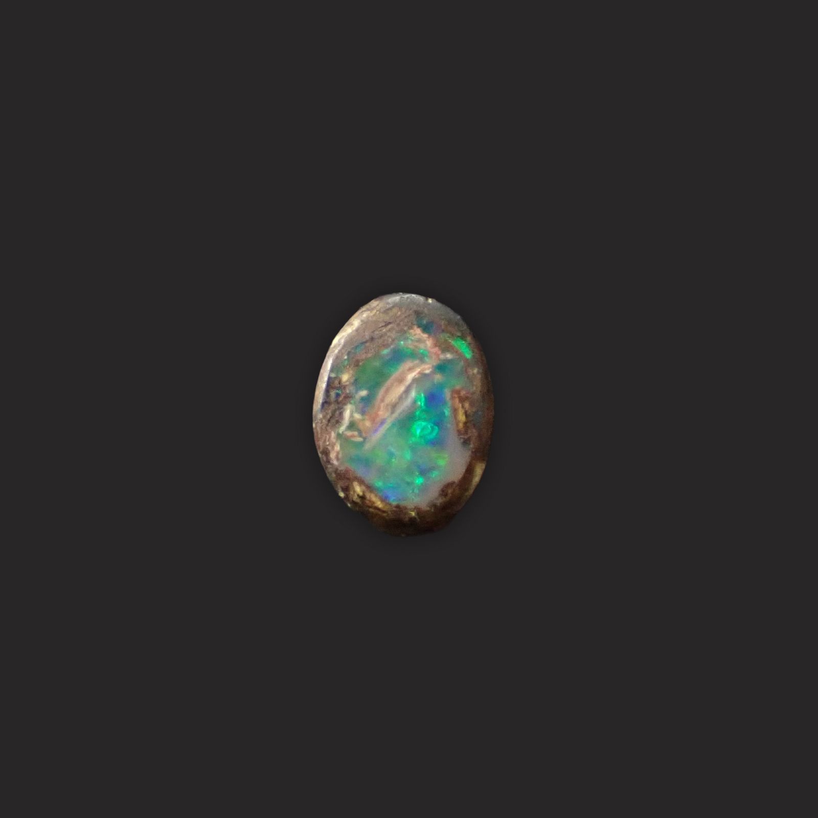 ウッドオパール オーストラリア産 0.21ct / 5x3.6mm前後 [251031198]