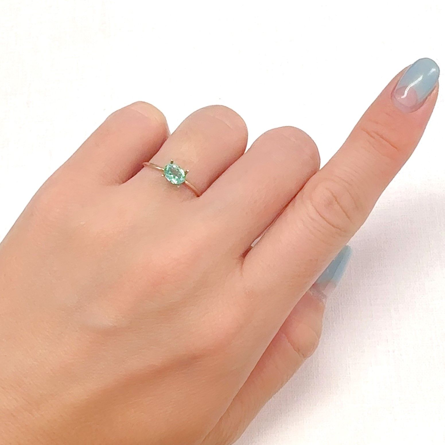 パライバトルマリン(宝石名トルマリン/別名パライバ・トルマリン)ブラジル・キントス鉱山産 0.42ct 識別済[240928719]5.7x4.3mm前後