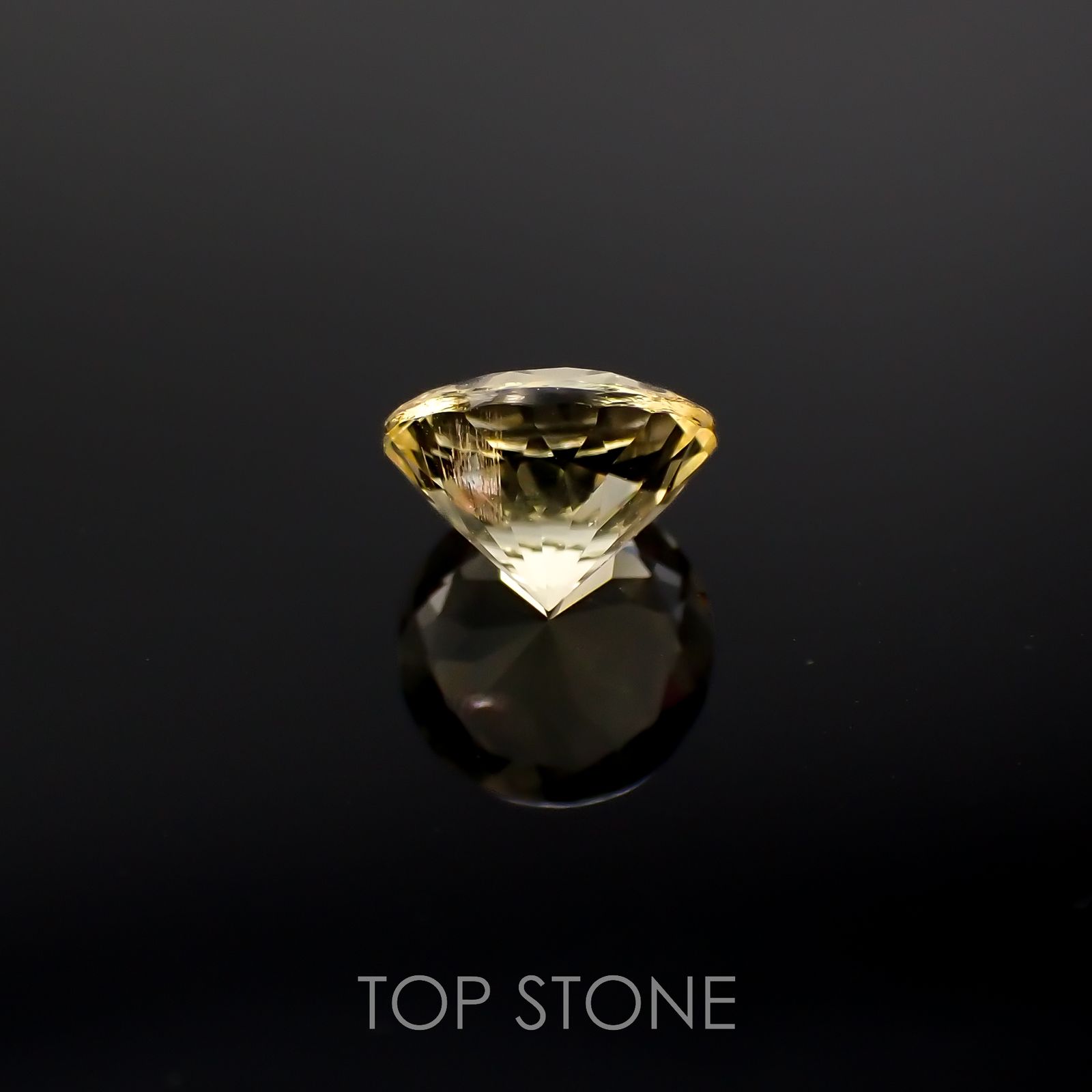 イエロースキャポライト(宝石名イエロー・スキャポライト)タンザニア産 0.78ct 識別済[220918027]6.1x6.1mm前後
