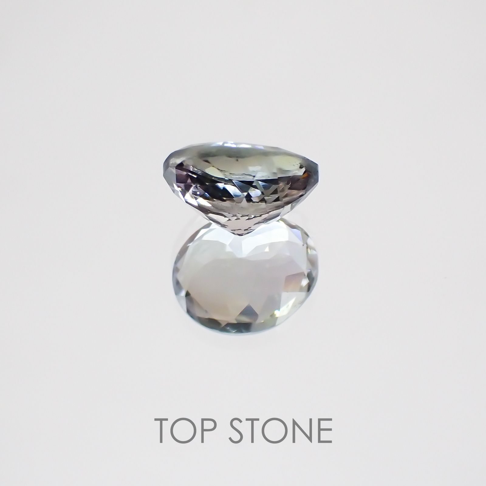 パーティカラータンザナイト(宝石名パーティカラード・ゾイサイト) タンザニア産 1.382ct ソ付(彩珠)[20074303]7.5×6.2mm前後