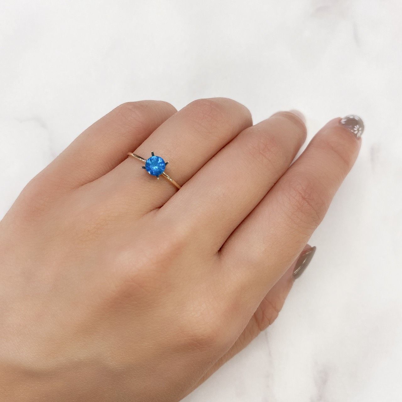 ネオンブルーアパタイト(宝石名アパタイト) マダガスカル産 0.50ct 識別済[210913047]4.9×4.9mm前後