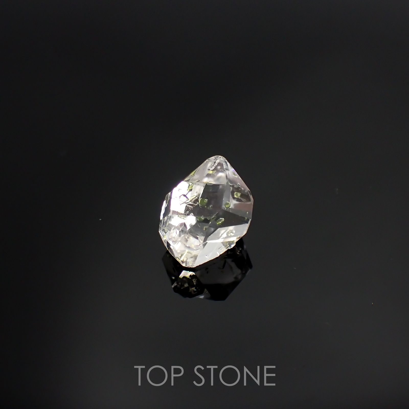 オイルインクォーツ パキスタン産 ルース 6.69ct[210811430]13.6×10.5mm前後